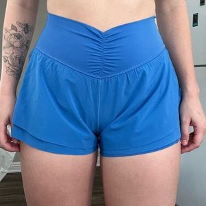 Blue AERIE Flowy Workout Shorts, Built in shorts, pockets